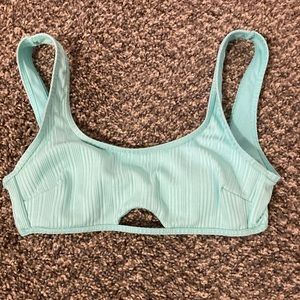 Light blue swimsuit with light pink bottoms